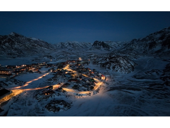 An aerial view shows the city of Sisimiut, Greenland on January 30, 2026. (Photo by Ina FASSBENDER / AFP)