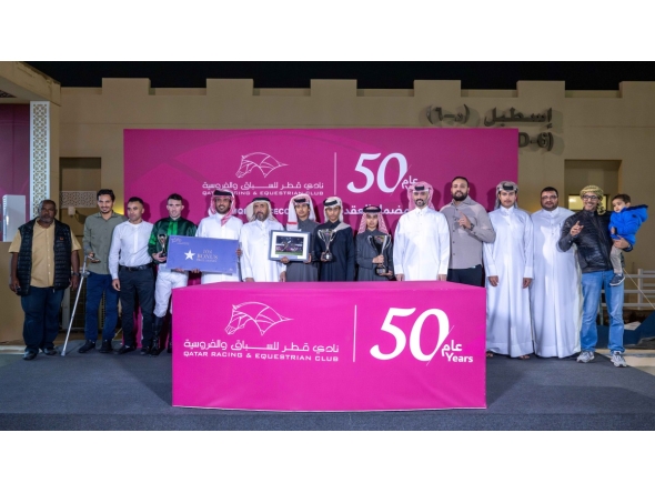 The connections of Maysara celebrate with the Marmi Cup trophy. PICS: Juhaim/QREC 