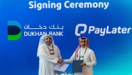 Dukhan Bank and PayLater officials during the signing ceremony.