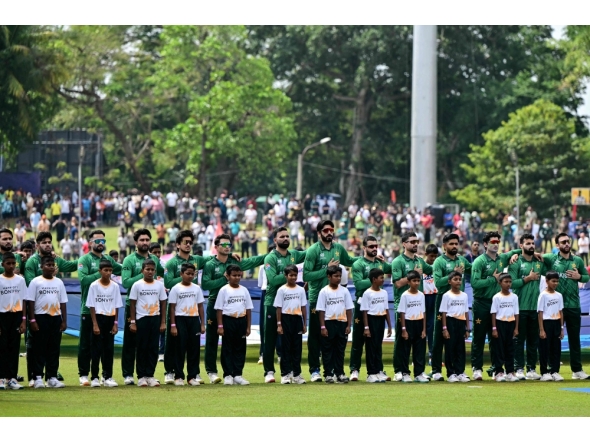 Pakistan players stand for the national anthem before the start of the 2026 ICC Men's T20 Cricket World Cup group stage match between Pakistan and Netherlands at the Sinhalese Sports Club (SSC) Ground in Colombo on February 7, 2026. (Photo by Ishara S.Kodikara / AFP)
 
