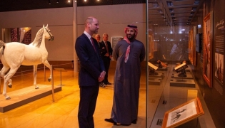 This handout picture taken on February 9, 2026 provided by the Saudi Press Agency (SPA) shows Saudi Arabia Crown Prince and Prime Minister HRH Prince Mohammad bin Salman bin AbdulAziz Al Saud meeting with Britain's Prince William, Prince of Wales in the old district of Diriyah on the outskirts of the Saudi capital Riyadh. (Photo by SPA / AFP)