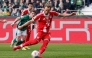 Bayern Munich's English forward #09 Harry Kane scores the opening goal from the penalty spot during the German first division Bundesliga football match between SV Werder Bremen and FC Bayern Munich in Bremen, northern Germany, February 14, 2026. (Photo by Focke Strangmann / AFP)