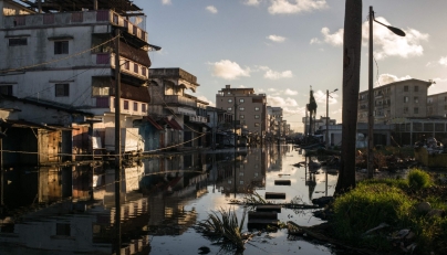 General view of a flooded street in Toamasina on February 15, 2026 after the passage of tropical cyclone Gezani. Photo by RIJASOLO / AFP