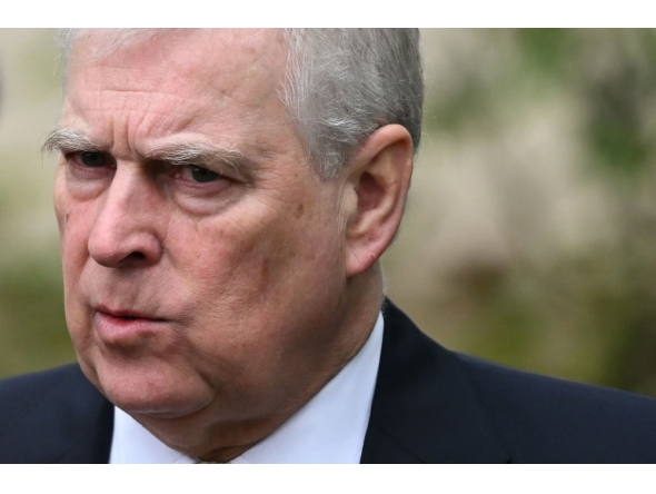 Britain's Prince Andrew, Duke of York reacts as he leaves St. George's Chapel, in Windsor Castle, after attending the Easter Mattins Service, on March 31, 2024.  (Photo by Justin Tallis / AFP)