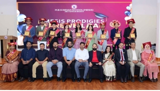 MES Indian School principal and officials with the outstanding students of 2026 during the event.