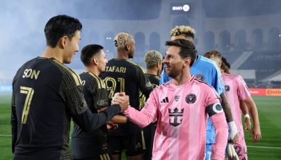 Lionel Messi #10 of Inter Miami CF. greets Son Heung-Min #7 of Los Angeles FC prior to the MLS match between Los Angeles Football Club and Inter Miami CF at Los Angeles Memorial Coliseum on February 21, 2026 in Los Angeles, California. Photo by KEVORK DJANSEZIAN / GETTY IMAGES NORTH AMERICA / Getty Images via AFP