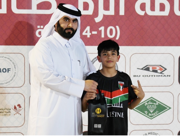 Zakaria Al Najjar of Palestine receives his Man of the Match award. 
