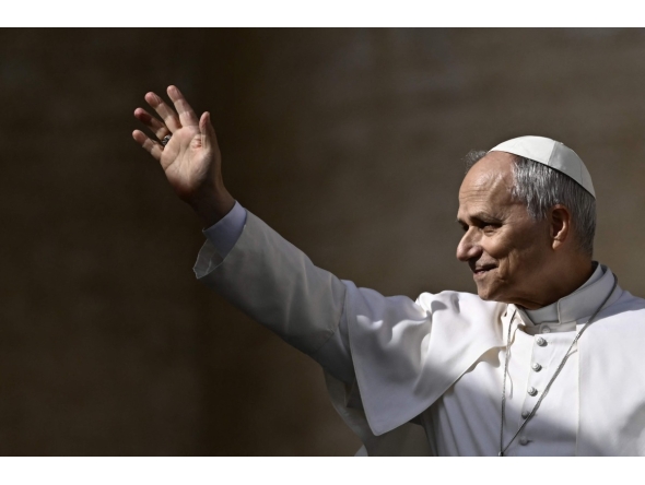 Pope Leo XIV waves to the crowd during the weekly general audience at St Peter's Square in The Vatican on February 18, 2026. Photo by Filippo MONTEFORTE / AFP