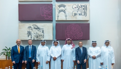 H E Dr. Mohammed bin Saleh Al-Sada and other officials during the meeting. 