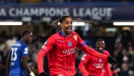 Paris Saint-Germain's French forward #29 Bradley Barcola celebrates after scoring his team second goal during the UEFA Champions League round of 16 second leg football match between Chelsea FC and Paris Saint-Germain (PSG) at Stamford Bridge, west London on March 17, 2026. (Photo by FRANCK FIFE / AFP)