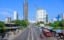 Commuters wait for public transport along a deserted road in Colombo on March 18, 2026.  (Photo by Ishara S. Kodikara / AFP)