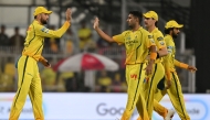 Chennai Super Kings' Indian cricket player Anshul Kamboj (2L) celebrates with teammates after taking the wicket of Rajasthan Royals' Indian player Vaibhav Suryavanshi during the 2026 Indian Premier League (IPL) T20 match between Rajasthan Royals and Chennai Super Kings at the Barsapara Cricket Stadium in Guwahati on March 30, 2026. (Photo by BIJU BORO / AFP) 