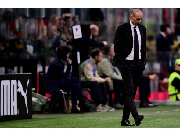 AC Milan's Italian head coach Massimiliano Allegri reacts during the Italian Serie A football match between AC Milan and Udinese at the San Siro stadium in Milan, northern Italy, on April 11, 2026. (Photo by MARCO BERTORELLO / AFP)