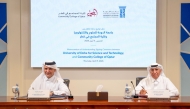 President of UDST Dr. Salem Al-Naemi and President of the Community College of Qatar Dr. Khalid Mohammed Al-Horr signing the agreement. 