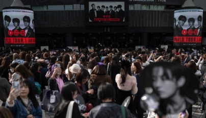 Fans of Korean boy band BTS arrive at Tokyo Dome before the start of the first BTS World Tour ‘Arirang’ in Tokyo on April 17, 2026. Photo by Andrew CABALLERO-REYNOLDS / AFP