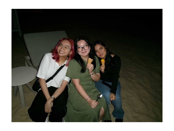 Gwyneth Estomo (GU’27), Lovie Francia (GU-Q’29), and Daphne Soriano (GU-Q’28) during an iftar on March 18, 2026.