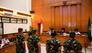 INDONESIA-RIGHTS-CRIME-COURT
Military personnel accused of throwing acid at human rights activist Andri Yunus attend a trial at a military court in Jakarta on April 29, 2026. 

 (Photo by Aditya Irawan / AFP)