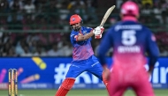 Delhi Capitals' Indian cricket player KL Rahul (L) plays a shot during the 2026 Indian Premier League (IPL) T20 match between Rajasthan Royals and Delhi Capitals at the Sawai Mansingh Stadium in Jaipur on May 1, 2026. (Photo by Manan Vatsyayana / AFP) 