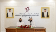 Director of the Da’wah and Religious Guidance Department Jassim bin Abdullah Al Ali, and Head of the Religious Guidance Section Muath Yousuf Al Qasim addressing a press conference.