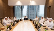 Minister of Commerce and Industry H E Sheikh Faisal bin Thani bin Faisal Al Thani with private sector representatives during the meeting yesterday.