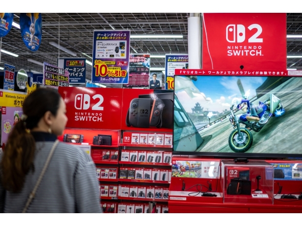 A customer visits the gaming section for Nintendo products at a shop in Tokyo on May 7, 2026. (Photo by Philip Fong / AFP)