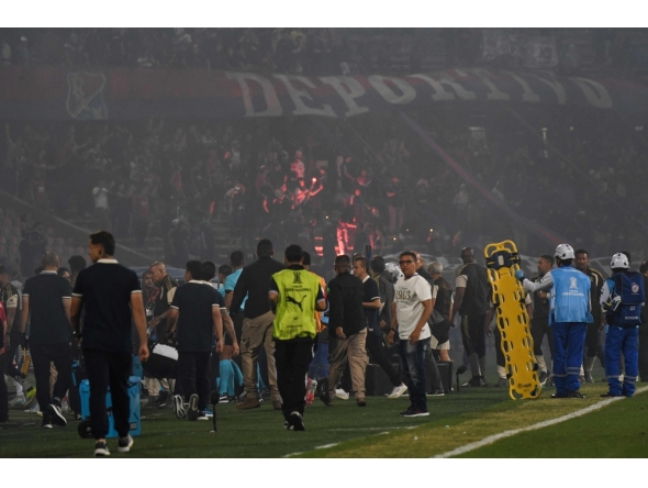 Medellin fans protest during the Copa Libertadores group stage football match between Colombia's Independiente Medellin and Brazil's Flamengo at the Atanasio Girardot stadium in Medellin, Antioquia department, Colombia on May 7, 2026. (Photo by Jaime Saldarriaga / AFP)