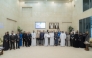 President of UDST Dr. Salem Al-Naemi with other officials receiving the certification. 