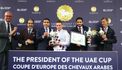 The connections of Lacaro Du Croate receive their awards after the Mansoor Khalil M. Al-Shahwani-owned mare won the President of the UAE Cup at ParisLongchamp yesterday.
