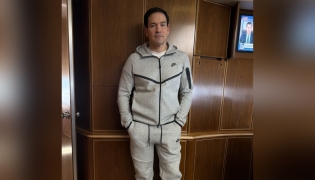 US Secretary of State Marco Rubio in Nike tracksuit. Photo shared by Steven Cheung on X. 
