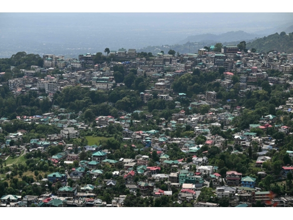 A general view of houses along the hilltop as seen from Indru Nag near Dharamsala on May 15, 2026. (Photo by Sajjad HUSSAIN / AFP)