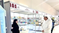 Fadhl Al Kaabi, offering books and children’s stories in the children’s section of the exhibition.