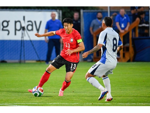 Son Heung-Min #13 of Korea Republic looks for a pass around Brayan Landaverde #8 of El Salvador during the second half of the international friendly match on June 03, 2026 in Provo, Utah. Alex Goodlett/Getty Images/AFP 