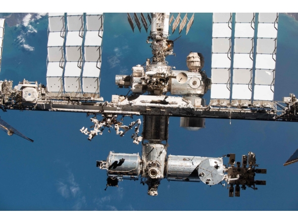 This handout image released by NASA on September 19, 2024 shows the International Space Station's US segment and portions of the Russian segment are pictured from the SpaceX Crew Dragon Endeavour during a fly around of the orbiting lab that took place following its undocking from the Harmony module痴 space-facing port on Nov. 8, 2021. Photo by Handout / NASA / AFP