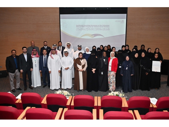 Officials and representatives of partner organisations with the graduates during the event.