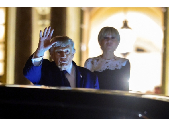 US President Donald Trump waves as he departs a dinner at Chateau de Versailles on June 17, 2026 in Versailles, France. Anna Moneymaker/Getty Images/AFP