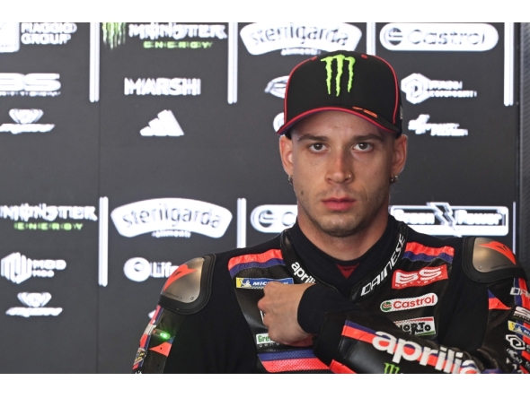 Team Aprilia Racing's Marco Bezzecchi is seen in the box during a free practice session prior to the MotoGP Grand Prix of Czechia in Brno, Czech Republic, on June 20, 2026. (Photo by Michal Cizek / AFP)