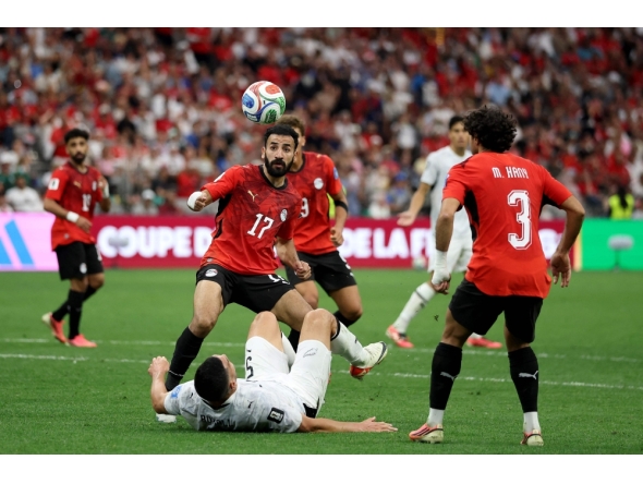 Mohanad Lashin #17 of Egypt competes for the ball against Michael Boxall #5 of New Zealand. Emilee Chinn/Getty Images/AFP