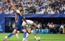 France's forward #10 Kylian Mbappe and Iraq's defender #05 Hashim Akam Rahman fight for the ball. (Photo by Roberto Schmidt / AFP)