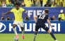 Brazil's forward #07 Vinicius Junior and Scotland's defender #13 Jack Hendry fight for the ball on June 24, 2026. (Photo by Patricia De Melo Moreira / AFP)