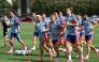 Japan players warm up during a training session. (AFP)