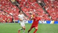 Alistair Johnston #2 of Canada and Ruben Vargas #17 of Switzerland compete for the ball on June 24, 2026 in Vancouver, British Columbia. Emilee Chinn/Getty Images/AFP