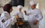 Palestinian youth learn the basics of cooking at the Smile Kitchen Academy, in the Rimal neighborhood of Gaza City on June 24, 2026. (Photo by Omar Al-Qattaa / AFP)