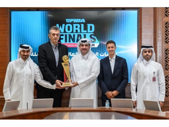 Officials pose with the eFIBA World Finals Season 4 trophy during a press conference in Doha, yesterday.