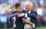 Gustavo Alfaro, Head Coach of Paraguay, embraces Gustavo Velazquez #2 after the penalty shootout win during the FIFA World Cup 2026 Round Of 32 match between Germany and Paraguay at Boston Stadium on June 29, 2026 in Foxborough, Massachusetts. (Photo by ROBERT CIANFLONE / GETTY IMAGES NORTH AMERICA / Getty Images via AFP)