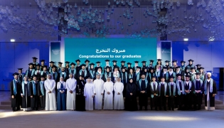 The Class of 2026 graduates with officials during the ceremony.