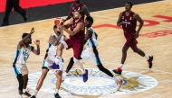 Action during the match between Qatar and India.