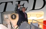 US President Donald Trump waves as he boards Air Force One at Ellsworth Air Force Base, South Dakota (Photo by Mandel Ngan/ AFP)