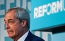 (FILES) Reform UK leader Nigel Farage attends a party press conference in London on November 18, 2025. (Photo by Justin TALLIS / AFP)