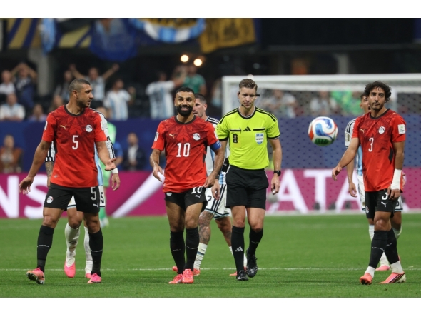 Egypt's defender #05 Ramy Rabia, forward #10 Mohamed Salah and defender #03 Mohamed Hany react during the 2026 World Cup round of 16 football match between Argentina and Egypt at Atlanta Stadium in Atlanta on July 7, 2026. (Photo by Odd Andersen / AFP)