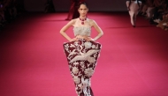  A model presents a creation by Manish Malhotra for the Women Haute Couture Fall/Winter 2026-2027 collection as part of the Paris Fashion Week, in Paris, on July 8, 2026. (Photo by Kenzo Tribouillard / AFP)